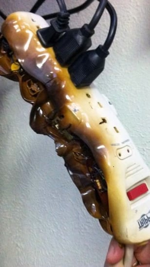 Melted and burnt power strip