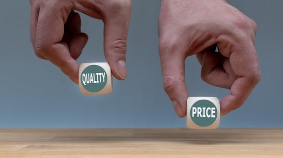 hands holding quality vs price